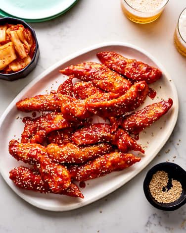 Honey-Gochujang Fried Chicken Tenders Recipe | Kitchn Shot Glass Appetizers, Gochujang Chicken, Fried Chicken Tenders, Crispy Chicken Tenders, Korean Fried Chicken, Chicken Tender Recipes, Baked Chicken Wings, Game Day Snacks, Honey Chicken