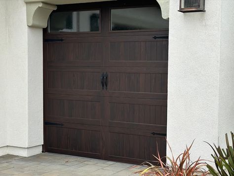 Archway Garage Doors | C.H.I. Stamped Carriage House Long Panel Design in the Walnut Accent Woodtone Color with Seeded Glass Oversized Windows with Decorative… | Instagram Walnut Garage Door, Wood Garage Doors, Oversized Windows, Overhead Door, Carriage House, Seeded Glass, Handcrafted Wood, Garage Door, Panel Design