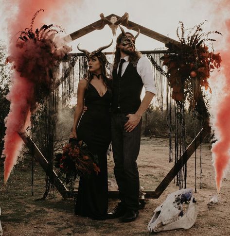 Perfectly Pinterest 🫶✨ Shop couples masks for any event at Masquerade Store 🎭❤️ Photography: bees.mulberry.photography Arch: sessionsevents Macrame: knottygirlsaz Makeup: youglowgirlaz Models: leah_darling thedavidjohn Hair: shelbysassaman_hairstylist Jewellery: bladesandbling Photography Arch, Dark Romantic Wedding, Gothic Wedding Theme, Couples Masquerade Masks, Dark Wedding Theme, Masks Halloween, Pagan Wedding, Mascaras Halloween, Viking Wedding