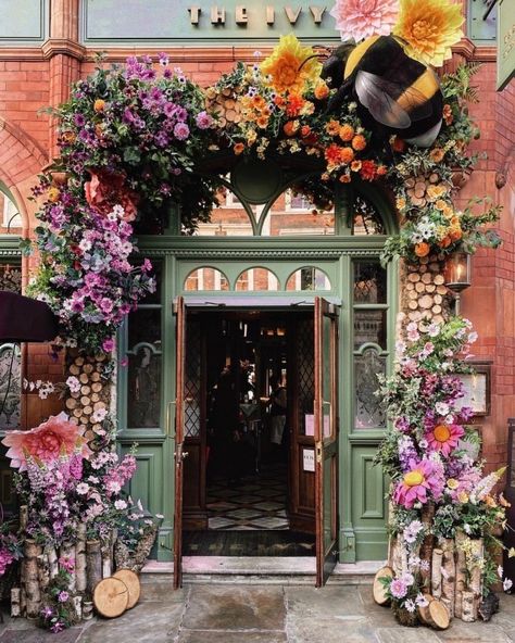 The Ivy Cafe,London, England _ photo by mylittleworld/ Instagram _ likefairytales I via tumblr # Coffeeshop # Traveling # The Ivy Cafe # UK # Gorgeous # Elegance # The Floral Doors # Floral Arrangements # London # Beautiful Beauty # Floral Entrances # Floral COFFEESHOPS #aesthetic Ivy Cafe, Ivy Flower, Restaurant Design Inspiration, Cafe London, Doorway Decor, London Cafe, Storefront Design, Cafe Door, Flower Store