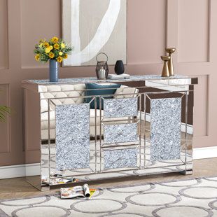 Mirrored Venetian Credenza. Beautifully hand engraved floral scrolls on antique mirror panels. Interior and base in gloss Ivory lacquered wood. 3 center drawers and 2 outer doors. Made in Italy. | David Michael Venetian 59" Credenza in Gray, Size 32.0 H x 59.0 W x 24.0 D in | Wayfair Glass Sideboard, Glam Mirror, David Michael, Kitchen Sideboard, Sofa End Tables, Acme Furniture, Sideboard Furniture, Furniture Deals, Sideboard Cabinet