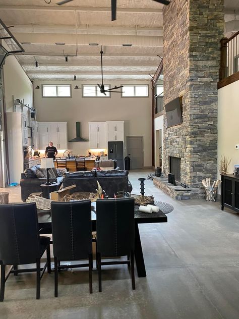 Garage Loft Living Space, Shops With Living Quarters, Shop Kitchen, Pole Barn Interior With Loft, Barndominium Garage Door Living Room, Pole Barn Home With Loft, Industrial Brick With Barn Wood, Barn Loft Apartment Contemporary, Loft Living Space