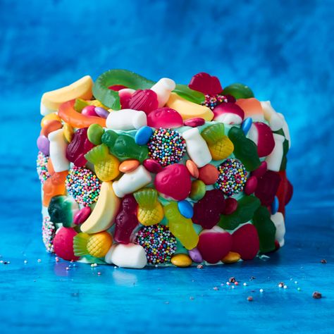 Turn heads with this fun and colourful lolly cake. This simple cake hack delivers above and beyond in terms of flavour, ease and wow-factor. Woolworths Cake Hack, Woolworths Cakes, Lolly Cake, 9th Birthday Cake, Lolly Bags, Cake Hacks, 6 Cake, Peppermint Christmas, Simple Cake