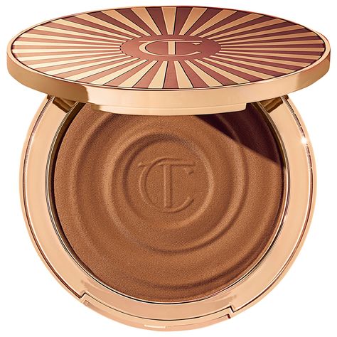 A 16-hour wear cream bronzer in 4 beautiful sun-kissed shades for face and body that blurs skin, hydrates with hyaluronic acid, and is sweatproof.Coverage: MediumFinish: NaturalFormulation: CreamHighlighted Ingredients: - Hyaluronic Acid: Hydrates and visibly revitalizes skin. - Vitamin D3: Helps protect skin upon exposure to sunlight. Best Charlotte Tilbury Products, Charlotte Tilbury Beautiful Skin, فنسنت فان جوخ, Beach Glow, Cream Bronzer, Charlotte Tilbury Makeup, Body Creams, Makeup Needs, Summer Glow