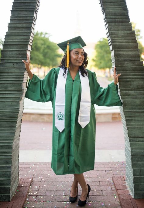 UNT Grad Pic ideas- Book Arch 📸 sanchezvmurray Green Graduation Gown, Green Graduation Gown And Cap, Graduation Gown Pictures, Unt Graduation Pictures, Grad Photos With Books, Gap And Gown Pictures Graduation, Unt Graduation, Unf Graduation Pictures, Untraditional Grad Photos