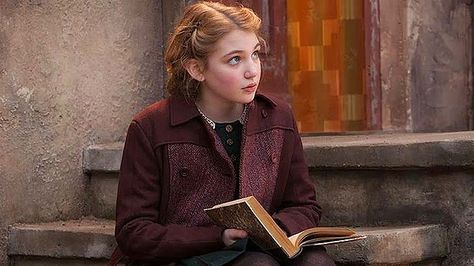 Liesel Meminger. She is known as the book thief. She has blond hair and brown eyes. In the beginning she is abandoned by her mother and has to go live with the Hubermanns. Liesel learns to read in the basement thanks to Hans. She loves her foster parents, Max, and Rudy. But she is very headstrong. She refuses to let people put her down and tell her she is dumb and she never allows Rudy to kiss her. She also has a sneaky personality and can steal anything without anyone knowing. Sophie Nelisse, Book Thief, Markus Zusak, The Book Thief, Nora Roberts, Woman Reading, Reading A Book, Girl Reading, John Green