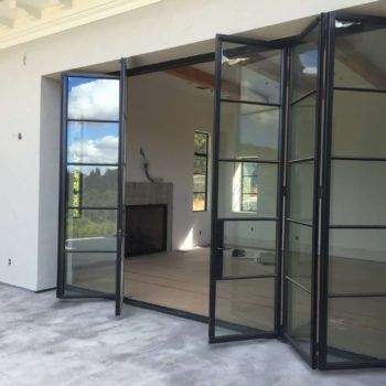 Custom Exterior Steel Bifold Doors | Euroline Steel Windows Bifold Patio Doors, Folding Patio Doors, Folding Windows, Steel Frame Doors, Steel French Doors, Steel Doors And Windows, Folding Glass Doors, Steel Windows, House Extension Design