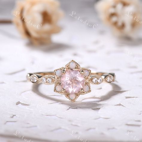 This is a 5mm Round Cut Rose Quartz engagement ring. The accent stones are opals and VVS man made moissanite diamond. This ring can also be made in genuine solid 10k, 14k, 18k gold or Platinum, and all the rings in my shop can be customized too! If you want to know more details about the ring, just contact with me anytime! If you want to customize the ring, just contact with me anytime! If you want to make a custom jewelry, just contact with me anytime! PROCESS TIME AND SHIPPING It usually takes Rose Quartz Ring Engagement, Cute Promise Rings, Pink Engagement Ring, Cute Engagement Rings, Engagement Ring Unique, Viking Ring, Flower Engagement Ring, Ringe Gold, Rose Quartz Ring