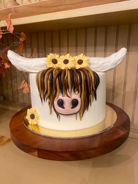 Highland Cow birthday cake with sunflower flower crown Highland Cow Cake With Sunflowers, Hi Land Cow Birthday, Cow Cake With Sunflowers, Cow Print And Sunflower Cake, Highland Cow Cake Smash, Highland Cow Birthday Cake Ideas, Fluffy Cow Birthday Party, Highland Cow Sheet Cake, Cow Cakes Birthday