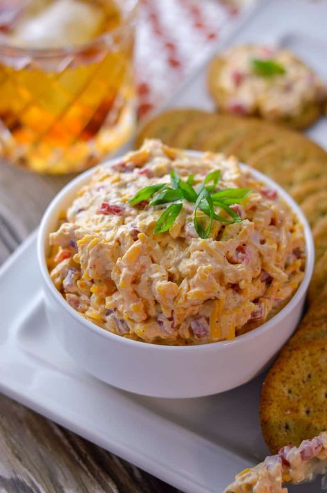 This Southern Pimento Cheese Spread will be the star at your party! Sweet, tangy with a subtle bite. Spread it, add to dishes or dip into it!  Try it with crackers or dip your favorite veggies.  It's great mixed into dishes for a twist, add it on your burger or make a grilled cheese sandwich with it. Pimento Cheese Ball Recipe, Pimento Cheese Ball, Yummy Grilled Cheese, Southern Pimento Cheese, Cheese Spread Recipes, Pimento Cheese Dip, Pimento Cheese Sandwiches, Homemade Pimento Cheese, Pimento Cheese Spread