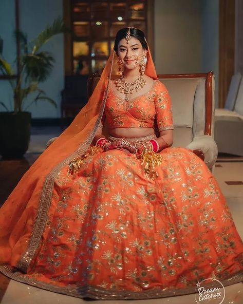 Top Orange Bridal Lehengas We Spotted On Real Brides Lehengas For Reception, Orange Bridal Lehenga, Orange And Gold Wedding, Lehenga Latest, Dupatta Draping Styles, Dupatta Draping, Latest Lehenga Designs, Draping Styles, Orange Lehenga