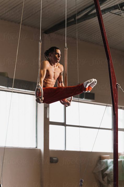 Male Gymnast Working Out On The Rings by Brkati Krokodil Gymnastic Rings, Male Gymnast, Gymnast, The Rings, Working Out, Track Lighting, Gymnastics, Royalty Free Stock Photos, Ceiling Lights