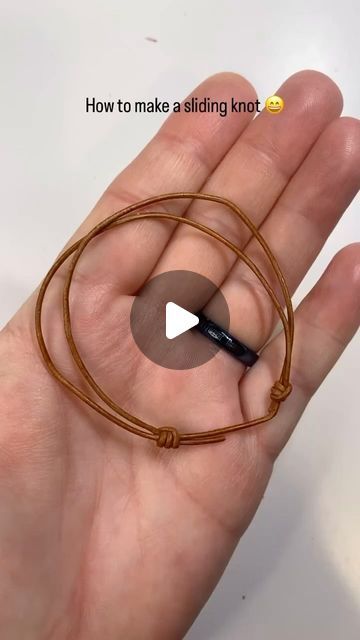 Andria Bieber on Instagram: "How to make a sliding ( barrel) knot with 1.5 mm leather cording from @limabeads  for bracelets or necklace leather jewelry   ( my cat Luna wanted to help 😂)  Directions:  Cut 18 inches of 1.5 mm cord ( so you have enough to work with for tying knots)  *Take the left strand of the cord and have it lay in front of the right strand of the cord. *Wrap the cord forming a loop around the right strand of the cord once and once again. Then take it back over to the left strand. Then feed it through the two loops you’ve just made it going from left to right.  *Pull tight. The knot will slide on the cord. *Now you want to do this again on the other side. *Take the end of the right hand strand, and make sure it’s in front of the left strand. Wrap it once  to form a loop Necklace Tie Sliding Knot, Necklace Slip Knot Leather Cord, How To Tie The End Of A String Bracelet, Waxed Polyester Cord Bracelets Diy, Loop Knot For Bracelet, Rattail Cord Bracelet, How To Tie A Necklace Knot, Leather Knots For Jewelry, Wax Cord Bracelet Diy Tutorials