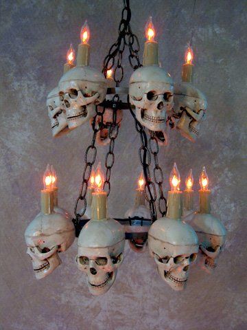 If you really want to get all spooky this Halloween and go all out with your decorating, this Two Tiered Medium Skull Chandelier can be the focal point of your efforts.  Nothing says Halloween like a chandelier decorated with skulls. It has 14 medium size skulls arranged in two levels. There are s Skeleton Chandelier, Skull Chandelier, Cheap Diy Halloween Decorations, Halloween School Treats, Halloween Products, Hallowen Ideas, Pirate Halloween, Adornos Halloween, Halloween Miniatures