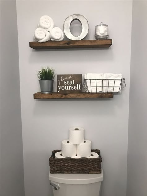 Half Bathroom Decor !. wood shelves and toilet paper in a basket.. Farmhouse bathroom remodel ideas Diy Bathroom Shelves, Half Bath Decor, Half Bathroom Ideas, Half Bath Ideas, Bathroom Diy Ideas, Half Bathroom Decor, Farmhouse Bathroom Remodel, Beautiful Bathroom Designs, Cheap Bathrooms