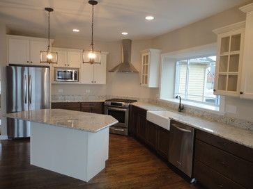 Dark Lower Cabinets White Upper, Kitchen Dark Lower Cabinets, Kitchen With Angled Island, Angled Island, Dark Lower Cabinets, White Upper Cabinets, Kitchen Dark, Lantern Lighting, Lower Cabinets