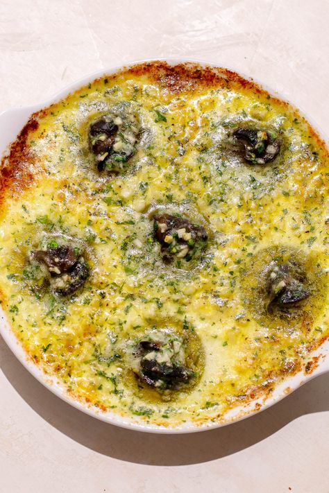 cooked escargot in a dish. Snail Recipes Garlic Butter, Escargot In Mushroom Caps Recipe, The Keg Escargot Recipe, Periwinkle Snails Recipe, Canned Escargot Recipe, Escargot Recipe Appetizers Garlic Butter, Escargot Recipe The Keg, Garlic Snails Recipe, Snail Recipes