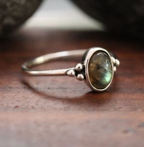 Item details Handmade item Ships from a small business in India Materials: Silver, Stone Gemstone: Labradorite Raw stone Gem color: Blue Band color: Silver Style: Boho & hippie Natural Labradorite Statement Ring, Labradorite Oval Ring, Blue Fire Labradorite Ring, Labradorite Silver Ring, Ring for Women, Gift For Him Description Metal :- 925 Sterling Silver Style : Ring Gemstone:- Labradorite Benefits Of Labradorite  It helps an individual regain energy while aiding the body and spirit in healing itself. In the metaphysical world, labradorite is considered one of the most powerful protectors. The gemstone creates a shield for auras and protects against negativity of the world. Occasion : Birthday Events, Lovely Valentine's Day Gift, Anniversary Gift, Weeding Gift, Engagement Ring, Lover Gif Soldering Rings, Hippie Engagement Ring, Hippie Engagement Rings, Labradorite Benefits, Labradorite Ring Silver, Labradorite Rings, Labradorite Engagement Ring, Labradorite Raw, Hippie Ring