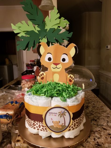 Lion king diaper cake Lion King Diaper Cake, Pamper Cake, Gender Reveal Box, Lion King Baby Shower, Lion King Baby, King Baby, Baby Lion, Online Parties, Safari Baby Shower