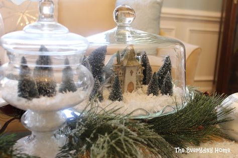 What a clever way to display your village keepsakes! Via The Everyday Home. #Christmas #decor Cake Stand Decor, Crystal Cake, Tree Centerpieces, Mini Houses, Dessert Aux Fruits, Glitter Houses, Snow Village, Plate Decor, Cake Cover