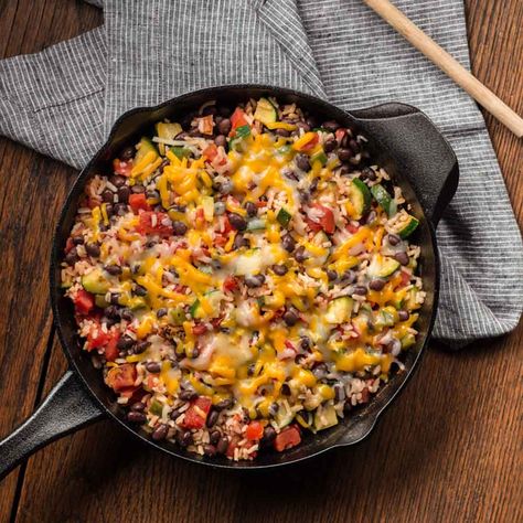 Zucchini combined with black beans, fire roasted tomatoes and rice for an easy skillet meal Black Bean And Rice, Spicy Zucchini, Zucchini Skillet, Zucchini Rice, Bean And Rice, Bean Rice, Ready Set Eat, Easy Skillet Meals, Black Beans And Rice