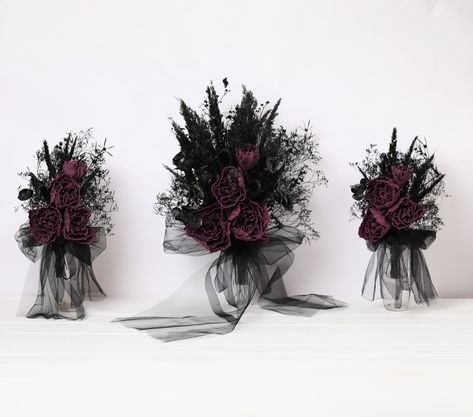 You will get the same bouquet from the picture. The photo 1 shows the bridal bouquet XXL (54 cm long x 40 cm diameter) , Bridesmaids bouquet 1(32 cm long x 21 cm diameter) , Bridesmaids bouquet (34 cm long x 26 cm diameter) Bridesmaids bouquet : Approximate Length: 34 cm; Approximate Diameter: 26 cm. Bridal bouquet: Approximate Length: 39 cm; Approximate Diameter: 30 cm. Bridal bouquet XL: Approximate Length: 46 cm; Approximate Diameter: 35 cm. Bridal bouquet XXL: Approximate Length: 54 cm; Appr Black And Eggplant Wedding, Dark Purple Bouquet, Black Veil Wedding, Gothic Forest Wedding, Gothic Wedding Bouquet, Purple Black Wedding, Black Bridal Veil, Eggplant Wedding, Whimsical Wedding Theme