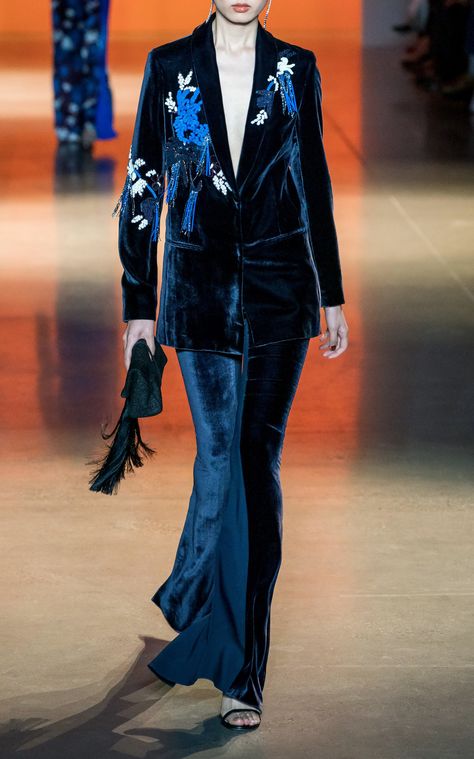 Embroidered and embellished velvet jacket and flared velvet pants by Cushnie