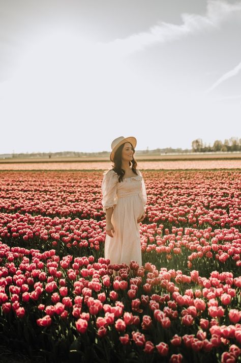 Pregnant mum walking in the Tulip fields Keukenhof Tulip Farm Maternity Photoshoot, Maternity Tulip Field, Tulip Field Maternity Photoshoot, Tulip Farm Photoshoot Family, Keukenhof Photoshoot, Tulip Maternity Photoshoot, Tulip Photoshoot Photo Ideas, Tulip Field Photoshoot, Tulip Photoshoot