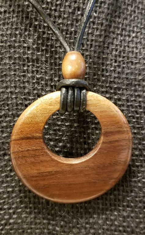 2 1/4" diameter black walnut pendant on adjustable black leather necklace. By the Woodchuck of Woodburn. Necklace Sliding Knot, Wooden Jewelery, Wood Jewelery, Driftwood Jewelry, Wood Resin Jewelry, Black Leather Necklace, Diy Collier, Jewelry Knots, Wood Turning Projects