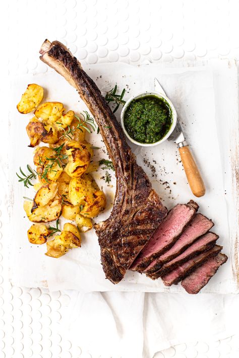 🥩🤤Meet the Tomahawk steak: a show-stopping, bone-in rib eye with a rich, beefy flavour and dramatic presentation.   Perfect for turning any meal into a special occasion, elevate your weekend by plating up this delicious bad boy, perfectly paired with crushed rosemary roast potatoes and zesty chimichurri. 👨🏼‍🍳😘  Simple, yet sophisticated - because sometimes the best meals are the ones that feel like a treat! 🍽️✨  #BarossaFineFoods #DinnerGoals #TomahawkSteak #FancyButEasy Steak Plating Presentation, Steak Photography Food Styling, Meat Plating, Steak Plating, Steak Photography, Rosemary Roast, Beef Barbecue, Tomahawk Steak, Best Meals