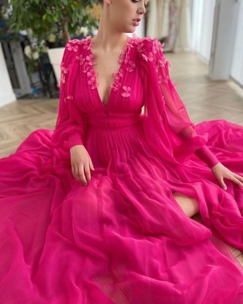 Luxury Vibrant Pink Dress, Luxury Pink Puff Sleeve Dress For Formal Occasions, Pink Floor-length Gown For Wedding Guest, Pink Long Sleeve Wedding Gown, Pink Long Sleeve Gala Gown, Long Sleeve Pink Gown For Gala, Long Sleeve Pink Gala Gown, Pink Wedding Dress With Sheer Sleeves, Pink Long Sleeve Evening Dress For Wedding