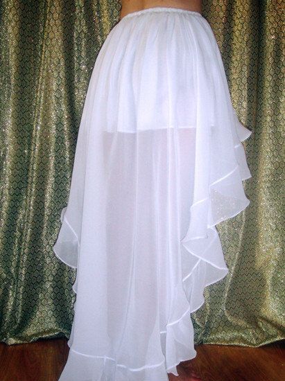 AMEYNRA HIGH LOW SKIRT WHITE CHIFFON ASYMMETRICAL, WITH RUFFLE. back side view Macrame Embroidery, Hot Bodysuits, White Flowy Skirt, Waterfall Skirt, Short Long Dresses, Skirts Flowy, White Long Skirt, Practice Outfits, Wedding Accessory