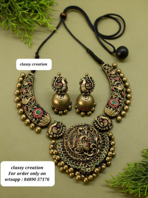 #fashionjewellery #Ganesha peacock #trendyjewelry #uniquejewelry # handmade #terracotta #flower #hasli #elegance #handmadejewellery #terracottanecklace #chokernecklace #traditional look #necklacedesign #classy #weddingjewelrysets #Style Terrakota Jewelry, Terracotta Design, Diy Earrings Materials, Terracotta Jewellery Making, Terracotta Jewellery Designs, Sculpture Art Clay, Terracotta Jewellery, Necklace Ideas, Blouse Hand Designs