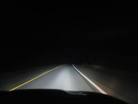 A dark night with a road outstretched, practically the only thing visible. Nowhere Aesthetic, Middle Of Nowhere Aesthetic, Middle Of Nowhere, Night Roads Aesthetic, Survive The Night Book Aesthetic, Night Time Road Aesthetic, Empty Road Night Aesthetic, Late Night Highway Aesthetic, Night Book