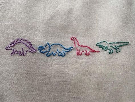 Embroidery Dinosaur Simple, Dinosaur Hand Embroidery, Hand Embroidered Clothes, Embroidering Ideas, Hand Embroidered Tote Bag, Embroidered Dinosaur, Dinosaur Embroidery, Embroider Ideas, Clothing Embroidery