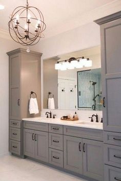 Washroom Lights, Farmhouse Bathroom Lighting, Bathroom Lighting Ideas, Makeover Kamar Mandi, Bathroom Lighting Design, Bathroom Vanity Remodel, Farmhouse Bathroom Vanity, Large Bathroom, Countertop Storage