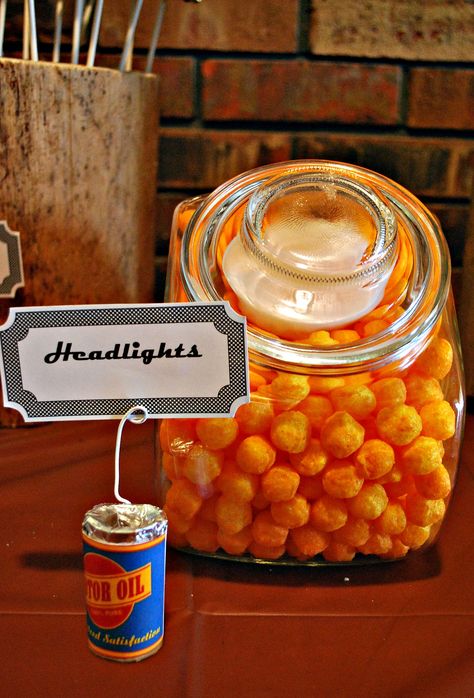 "Headlights" round cheese puffs for Joseph's Mater Party, also could go for any car party Car Themed Food Snacks Ideas, Nascar Party Ideas, Race Car Themed Food, Mater Birthday, Nascar Birthday, Mcqueen Party, Nascar Party, Auto Party, Mcqueen Birthday