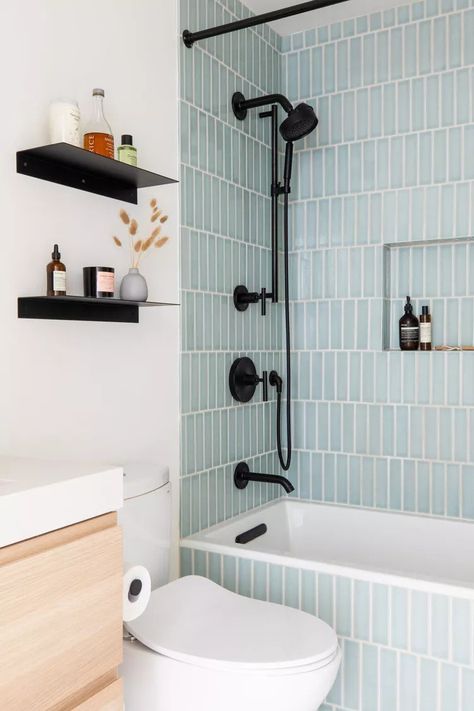 18 Best Tile Ideas for Small Bathrooms Small Bathroom With Black Tile Floor, Bathroom Tub And Tile Ideas, Tiling Small Bathroom, Small Bathtub Remodel, Shower Tub Combo Remodel Small Baths, Subway Tile Small Bathroom, Tub With Tile Walls, Small Bathroom Tub, Tile Ideas For Small Bathrooms