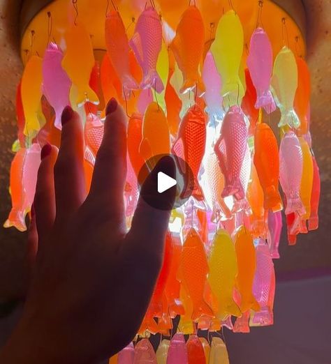 Kaarin Staalsen on Instagram: "The Swedish fish chandelier😍 Made completely out of resin! This project was such a labor of love - but I have no regrets! Every day I will get to smile at the ridiculousness of it all😂  . . . #diy #art #artist #diyprojects #diydecor #resin #resinart #diycrafts #homedecor #home #homeinspiration #interiordesign #craftideas #colorfuldecor #maximalist #kaarinjoy #explore #explorepage #pinterestinspired #artoftheday" Fish Chandelier, Resin Chandelier, Swedish Fish, No Regrets, Diy Resin, Colorful Decor, Resin Art, Art Day, Diy Art