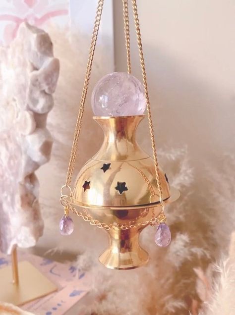 Immerse yourself in the mystique of this ethereal creation. Meticulously crafted with the divine touch of Amethyst crystal frequencies that grace this magical incense burner, radiating energies of protection, manifestation, and unwavering focus. Three high quality faceted Amethyst crystal beads and one Amethyst crystal sphere, accompany this celestial heirloom, enhancing its mystical charm. Measuring approximately 4 inches, each detail of our Amethyst Protection Incense Burner is a testament to Protection Incense, Protection Manifestation, Amethyst Protection, Instagram Sales, Image Swag, High Vibrational, Jewelry Repair, Crystal Sphere, Incense Burner