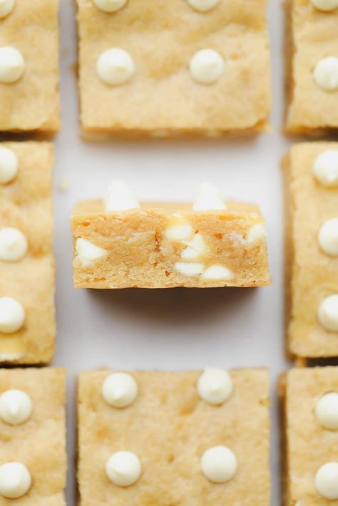 Vegan Blondies - Nora Cooks Vegan White Chocolate Cookies, Eggless Blondies Recipe, Vegan Blondie, White Chocolate Chips Recipes, Unhealthy Desserts, Vegan Blondies, Vegan Dessert Bars, Nora Cooks, White Chocolate Desserts