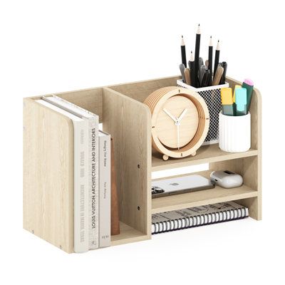 Ebern Designs Hermite Wooden Desktop Bookshelf Storage Organizer is your go-to solution for a clutter-free home or office workspace. Its minimalist design effortlessly complements your desk and countertop while offering ample space for books, stationery, and other essentials. Transform your desk into an organized and visually pleasing area with this versatile and stylish bookshelf organizer. The Desktop Organizer is made of CARB-grade composite wood tested for durability and sturdiness. Assembly Wooden Organization, Wooden Desk Decor, Desk Organizer Aesthetic, Desk Organizer Ideas, Stylish Bookshelf, Office Supplies Storage, Room Organizers, Desktop Organiser, Wood Desk Organizer