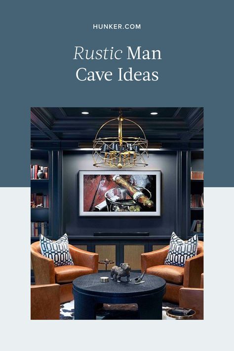 Yes, a flatscreen and surround-sound speakers are essential for a man-cave, but so is good decor, functional furniture, and a stylish color palette. Thirsty for some inspo? Here are six rustic man cave ideas that are both relaxed and sophisticated. #hunkerhome #mancave #rustic #mancaveideas #basement Man Cave Paint Colors, Rustic Man Cave Ideas, Man Cave Couch, Man Cave Paintings, Man Cave Colors, Classy Man Cave, Dark Blue Paint Color, Small Man Cave, Rustic Man Cave