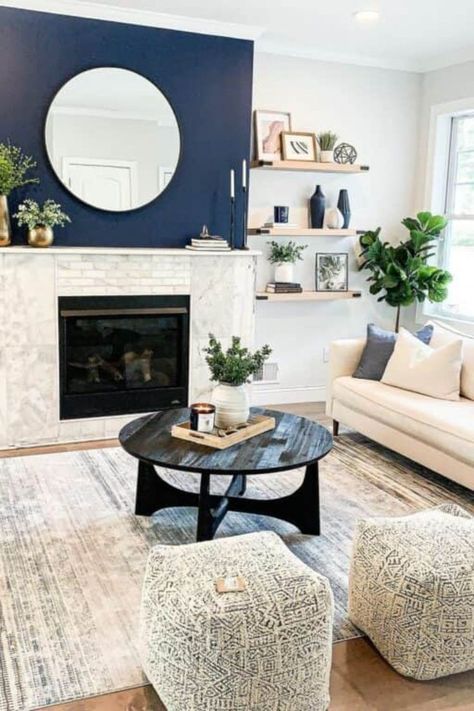 7 Accent Colors That Will Transform Your Farmhouse Living Room into a Cozy Retreat! Navy Wall White Fireplace, Navy And White Living Room, Dark Blue Feature Wall, Modern Coastal Living Room Ideas, Taupe Living Room, Coastal Fireplace, Modern Coastal Living Room, House Fireplace, Navy Living Rooms