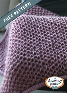 Gear up for the fall and winter seasons by making this super soft knit waffle blanket that's perfect for relaxing indoors. This easy knitting pattern, despite being airy, has a non-obtrusive frame made by applying a 3-stitch attached icord. | Discover over 5,500 free knitting patterns at theknittingspace.com All Free Knitting, Easy Blanket Pattern, Knitting Space, Winter Knitting Patterns, Fall Knitting Patterns, Purple Blanket, Cable Knitting Patterns, Knit Blankets, Dishcloth Knitting Patterns