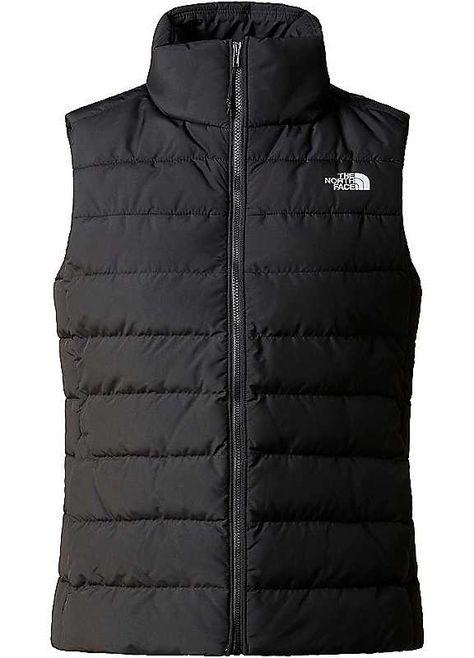 Introducing the North Face Quilted High Collar Gilet! This stylish and warm gilet is perfect for outdoor activities. It's quilted, has a high collar to keep you cozy, is water repellent, and features two zip pockets. So stay warm and look great this winter with The North Face Quilted High Collar Gilet!Brand: The North FaceQuiltedRecycled polyester with water-repellent, PFC-free and durable DWR coatingHandwarmer pockets with safety zippersExposed front zipThermal print logo on left chest and back Cold Weather Hiking, North Face Womens, Sport Outfit Woman, Walking Boots, Water Proof Case, North Face Women, Casual Jacket, High Collar, Hand Warmers