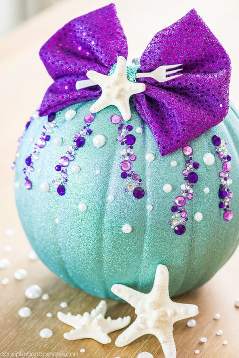 DIY No-Carve Little Mermaid Pumpkin – how to make a Disney Ariel inspired pumpkin with glitter, pearls, seashells and a mini fork to complete your under the sea creation. Little Mermaid Pumpkin, Mermaid Pumpkin, Princess Pumpkin, Magic Crystals, Princess Halloween, Pumpkin Vase, Disney Pumpkin, Pumpkin Contest, Artsy Ideas