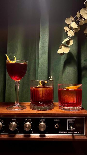 Bell&Viv Kings Cross on Instagram: "The Negroni has become so much more than a drink… So it’s only right we dedicate a whole week to appreciate it in all of its forms. Here we have a Classic Negroni, Boulevardier, and our own Chocolate Cherry Negroni (found on our @the_drinks_trolley menu). This is just the start so get ready for more Negroni Week Content. Come and visit us this weekend and enjoy our whole Negroni menu!!!" Negroni Photography, Negroni Aesthetic, Negroni Bar, Classic Negroni, Vinyl Record Room, Food And Drink Photography, Ibiza Restaurant, Cocktail Pictures, Jazz Party