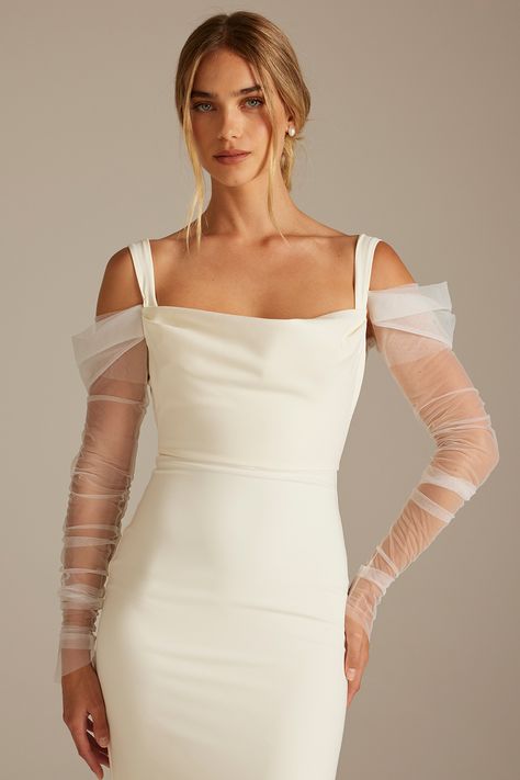 Embrace a new era of bridal elegance with the Delilah sleeve. These detachable wedding dress sleeves feature soft ivory tulle ruching for an elegant, fashion-forward bridal look.  ​

Transform your gown from ceremony to reception. Delivered with an extra set of poppers that can be hand-stitched to your gown, allowing you to effortlessly attach and detach the Deliliah sleeves on your special day. Detachable Wedding Dress Sleeves, Wedding Dress Grace Loves Lace, Fit Flare Wedding Dress, Detachable Sleeves Wedding Dress, Wedding Sleeves, Bridal Sleeves, Art Deco Wedding Dress, Wedding Dress Topper, Detachable Wedding Dress