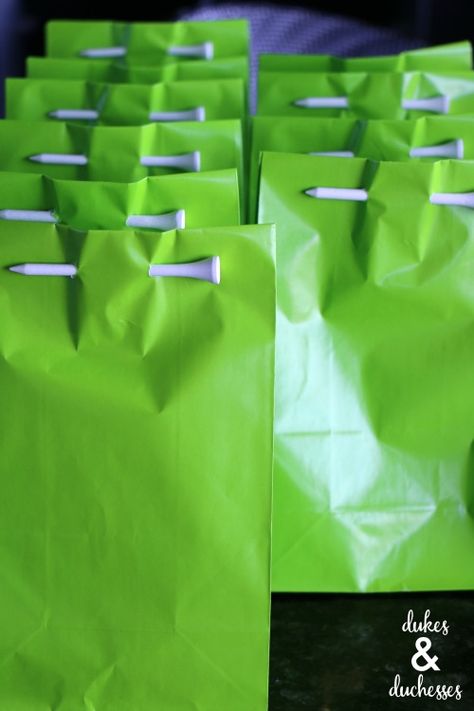 Golf Treat Bag Ideas, Top Golf Party Favors, Glow Golf Party, Golf Trip Goodie Bag, Golf Treat Bags, Golf Goodie Bags, Golf Giveaway Ideas, Golf Tournament Tent Ideas, Golf Party Activities